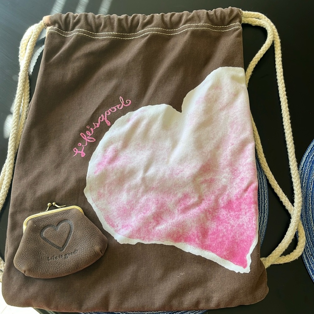 Life is good drawstring and change purse. Like new   Brown and pink